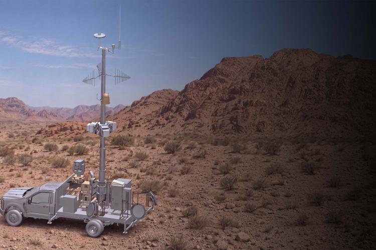 a rendering of CACI's SkyValor truck against a desert backdrop