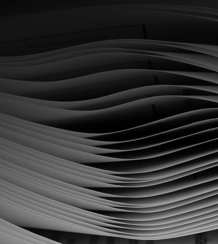 Black and white image of a book featuring a distinctive wavy pattern on its cover.