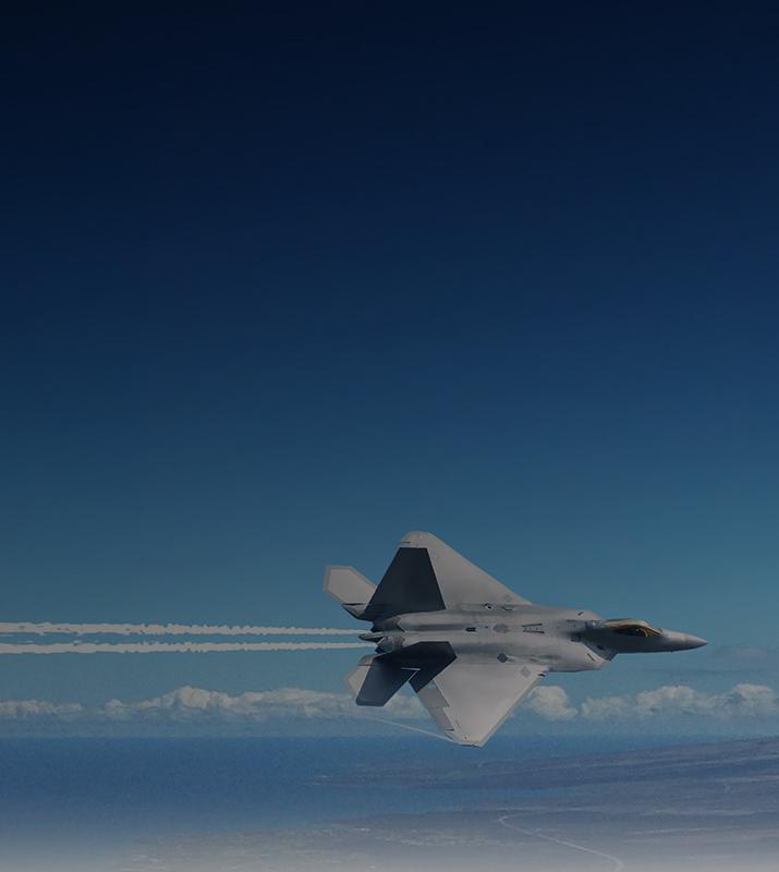 A fighter jet speeding through the air.