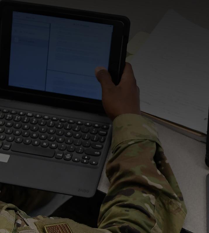 Soldier looking at tablet screen