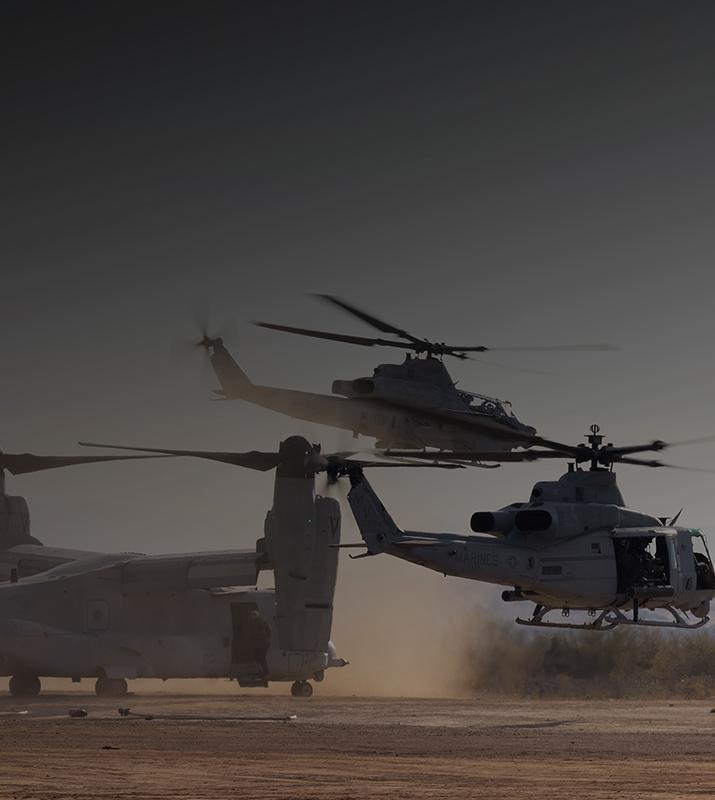 A group of soldiers loading into a helicopter