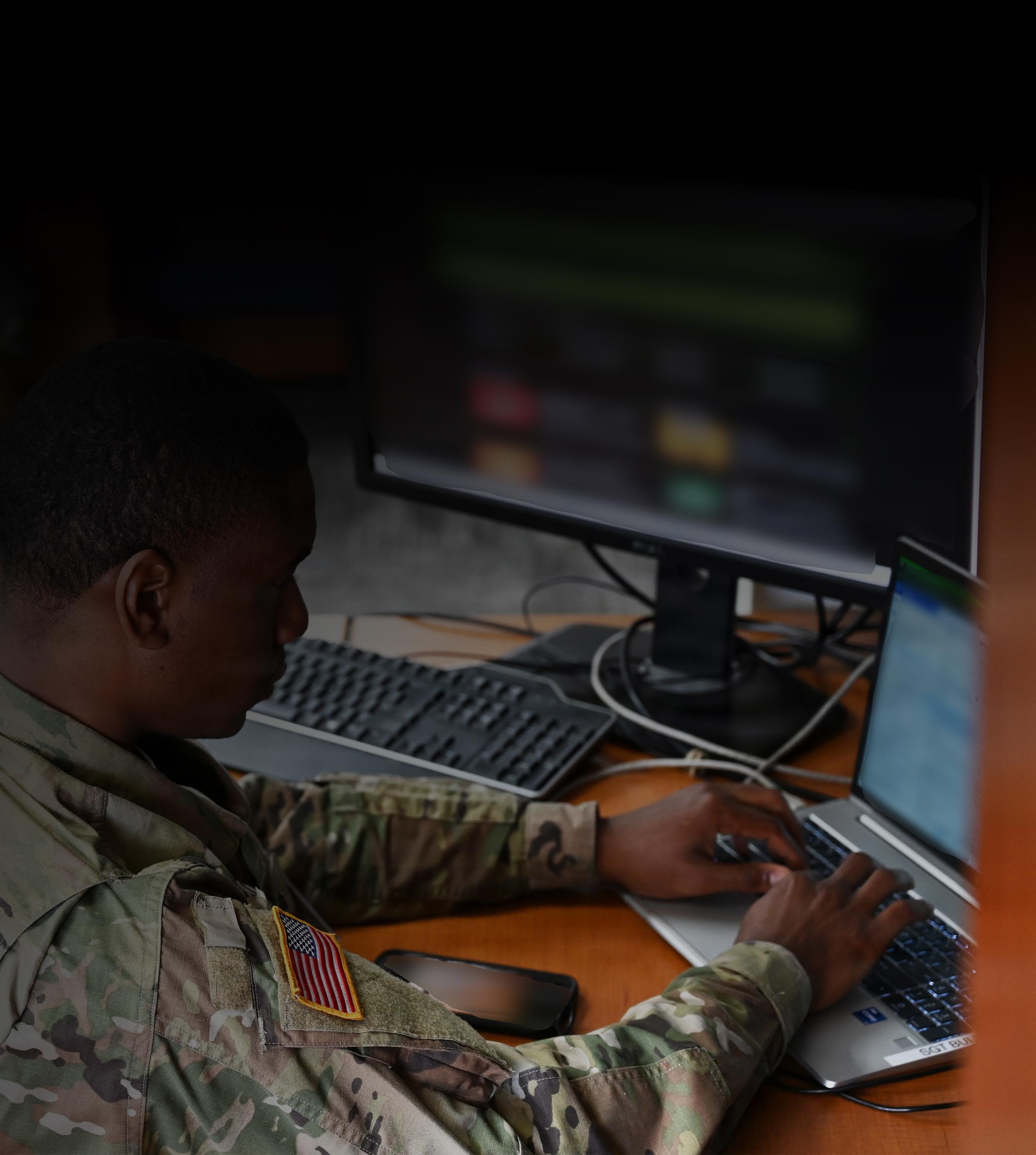 A military official working on a computer