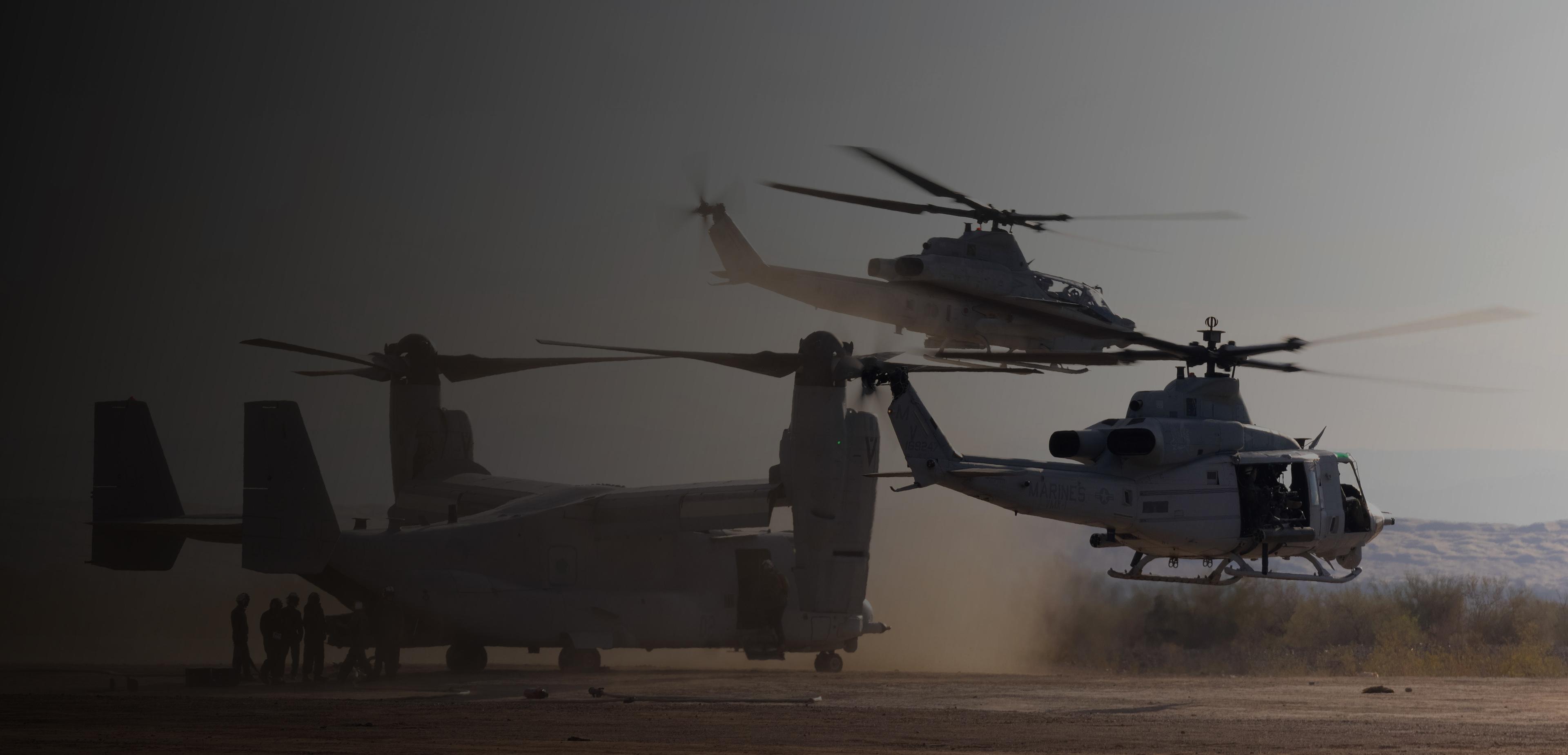 A group of soldiers loading into a helicopter