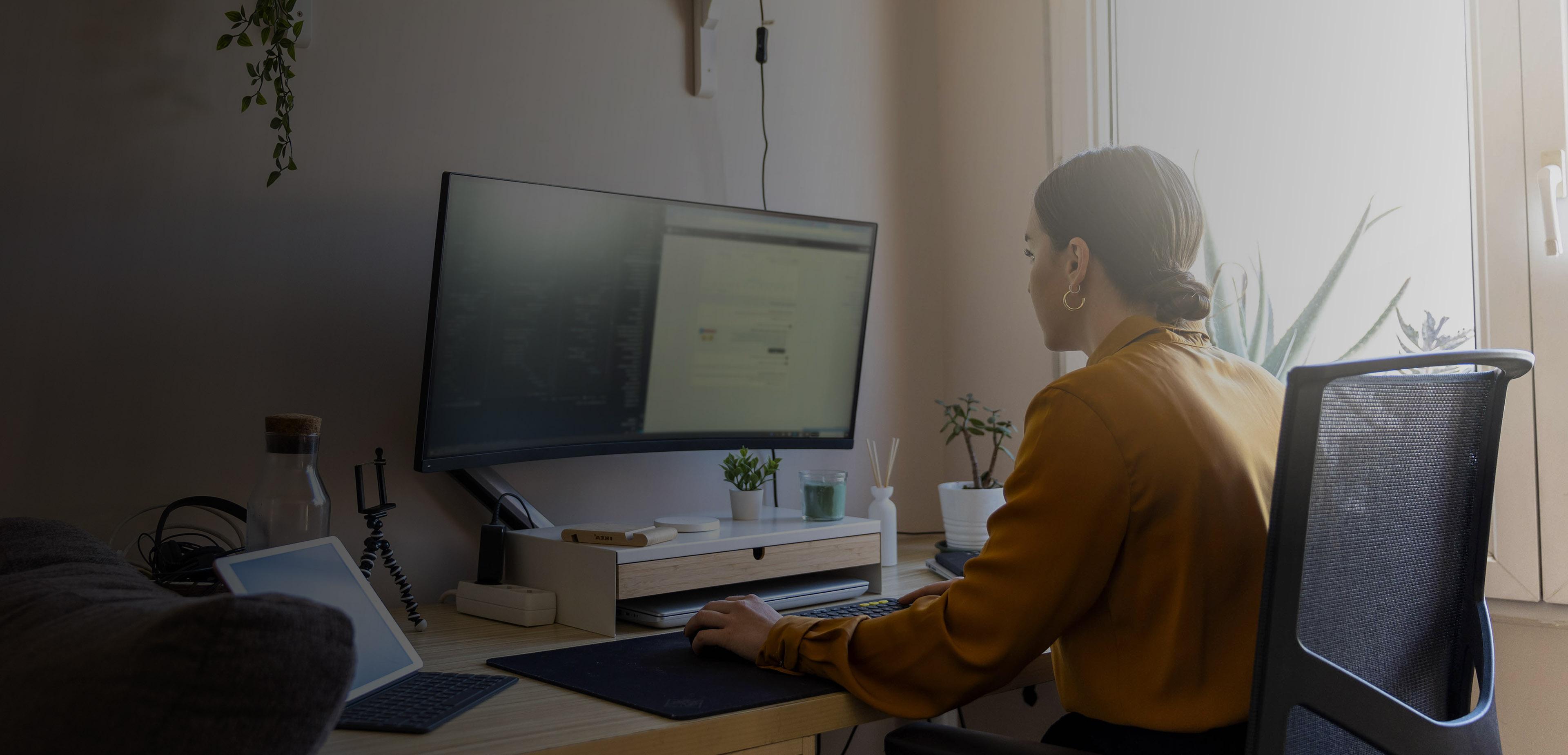 A woman working at a computer