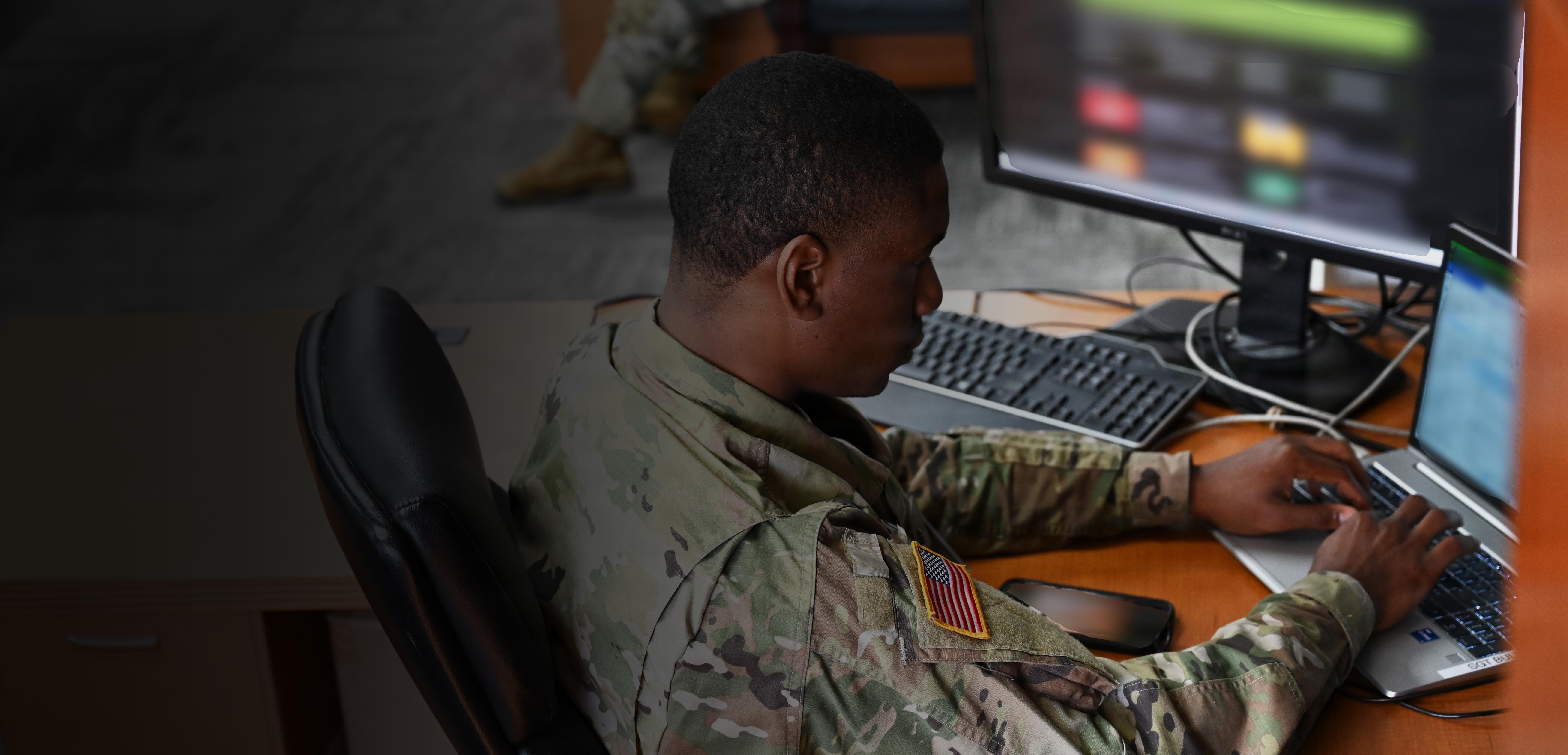 A military official working on a computer