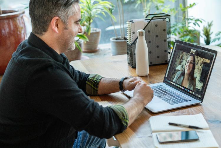 Two individuals on a video conference call